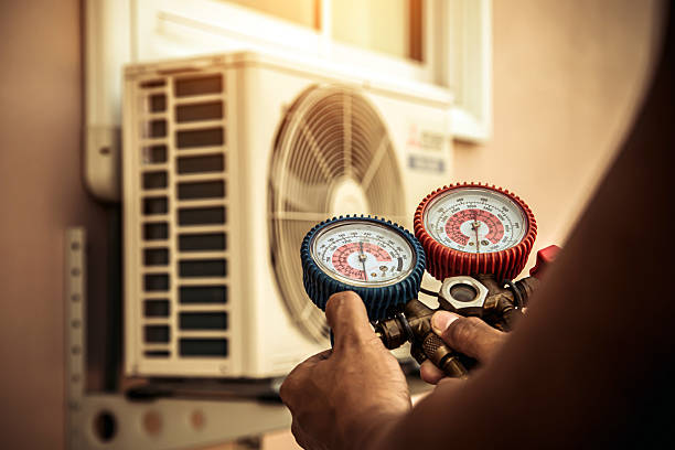 Professional Heat Pump Repair technician working in Jefferson City, MO